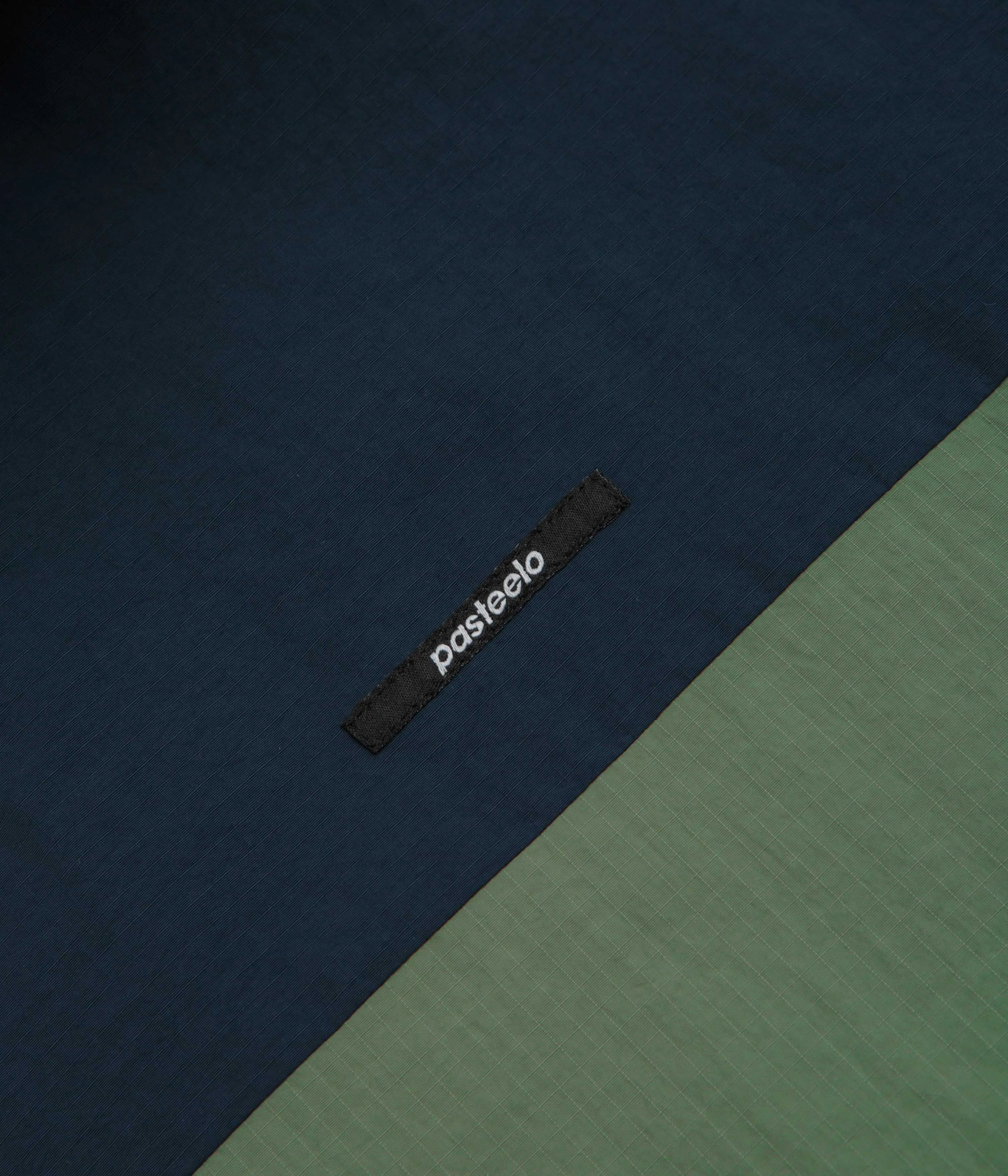 Pasteelo Hooded Windbreaker Jacket - Navy / Olive / Gold